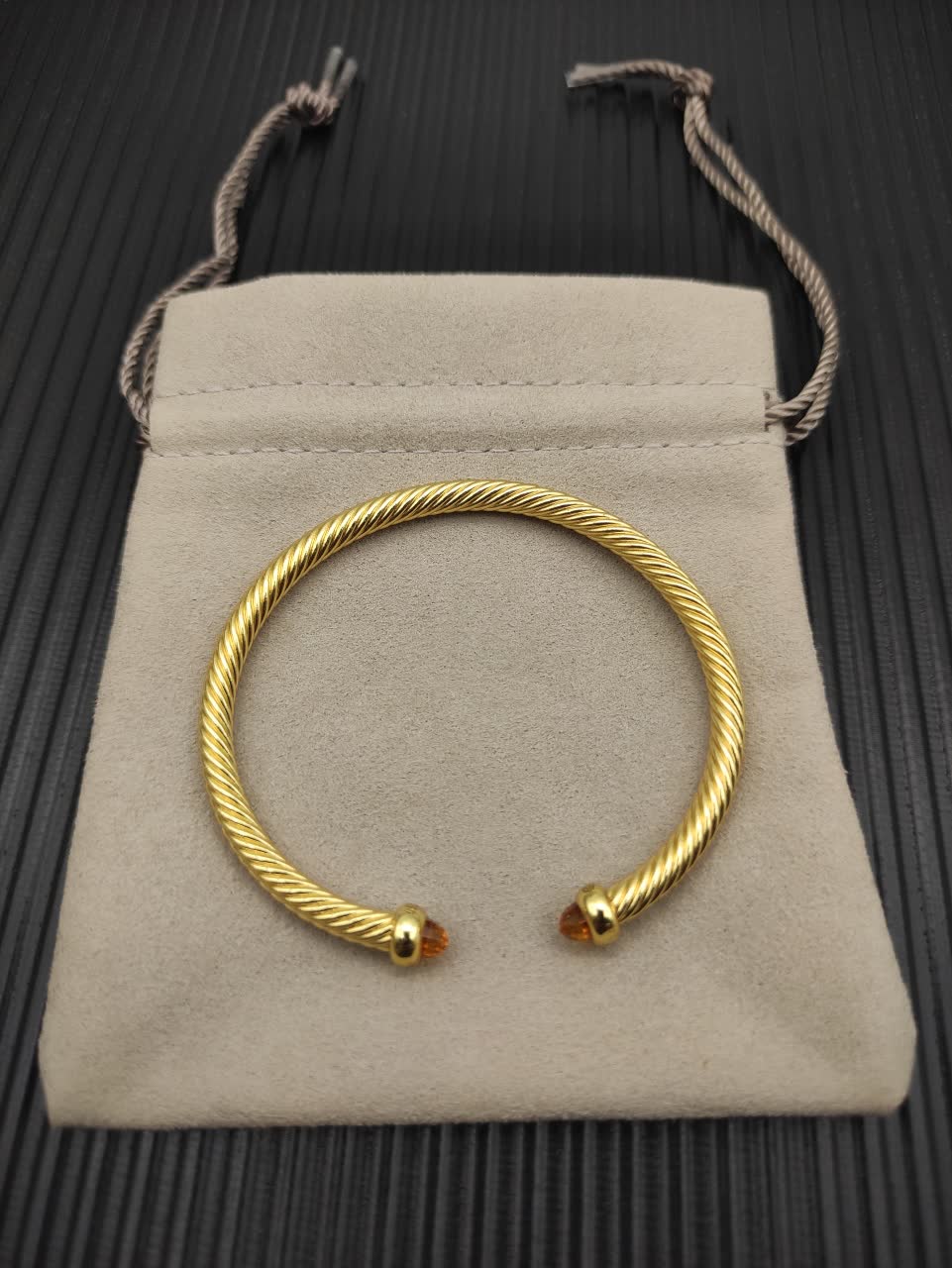 David Yurman Gold Tone Wire Bangle Bracelet with Orange Crystal Accents